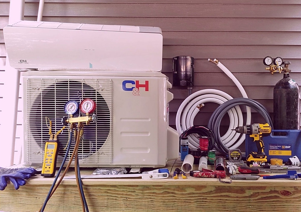 Complete professional HVAC diagnostic manifold gauges, digital multimeter, and tune-up station